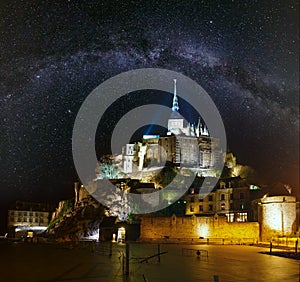 Night Mont Saint-Michel and Milky Way in sky, France