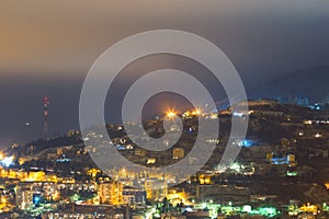 Night mountain city light landscape photo