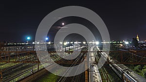 Night movement of trains on a railway junction in moon light