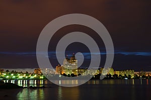 Night Obolon embankment view with river in Kyiv