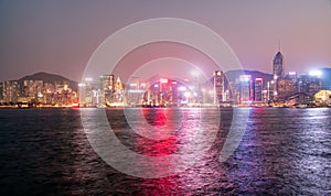 Night panorama of the evening city of Hong Kong with skyscrapers.