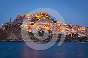 Night panorama of famous medieval town of Castelsardo, Sardinia, Italy