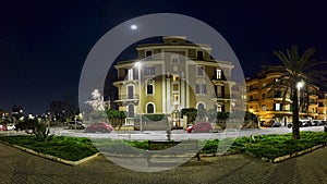 Night panorama of Piazza Anco Marzio located in the pedestrian area and the center of the night life in Ostia Lido a beachfront photo