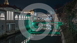 Night panorama of Plecnik arcades in the centre of ljubljana on a beautiful night. Bridges in the background