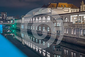 Night panorama of Plecnik arcades in the centre of ljubljana on a beautiful night. Looking from the three bridges