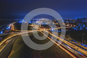 Night panoramic view of the Costa Verde high way and Costanera at the sunset, San Miguel - Lima, Peru. photo