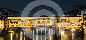 Night panoramic view of Vecchio Bridge, Florence