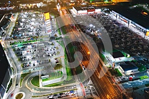 Night parking near shopping centers from a bird`s eye view