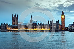 Night photo of Houses of Parliament with Big Ben, Westminster Palace, London, England