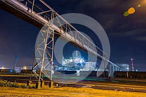 Night photo of industrial freight trains