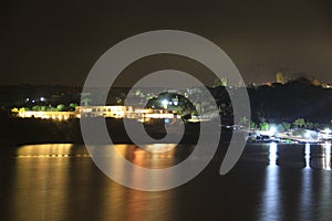 Night photo laga exposure in lake with reflection in the water photo