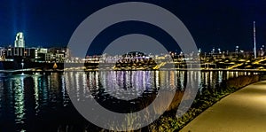 Night photo of the lake at the Heartland of America Park at the Riverfront in Omaha Nebraska USA.