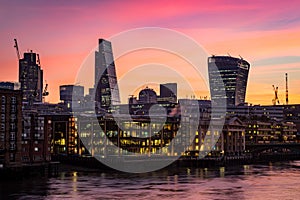 Night photo of London silhouette, offices by the Thames river