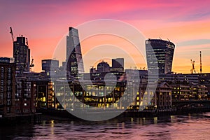 Night photo of London silhouette, offices by the Thames river photo