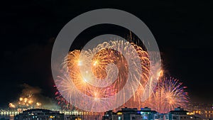 Night photo of New Year's arrival (RÃ©veillon) with fireworks in the sky