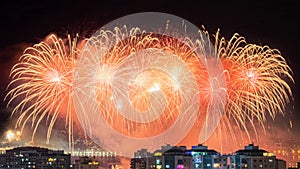 Night photo of New Year's arrival (RÃ©veillon) with fireworks in the sky