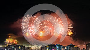 Night photo of New Year's arrival (RÃ©veillon) with fireworks in the sky