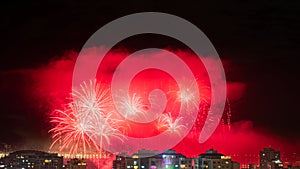 Night photo of New Year's arrival (RÃ©veillon) with fireworks in the sky