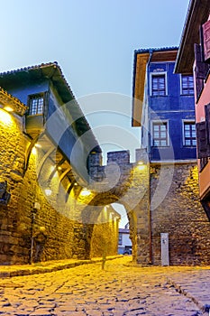 Night photo of old houes and ancient fortress entrance of old town of Plovdiv, Bulgaria