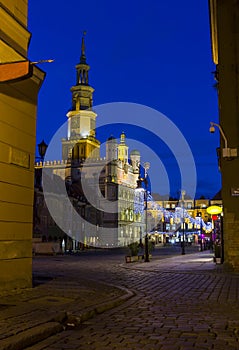 Night photo of an old town square and city hall in Poznan, Poland