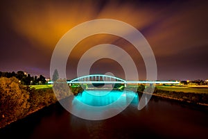 Night photo of train bridge over Sava river in Croatia