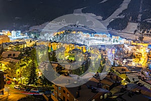 Night photography of beautiful El Tarter town illuminated by street lights, Andorra