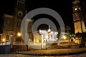 Night photography center of the magical town Cuetzalan Pueblo with view of the government palace, kiosk and the church of San Fra