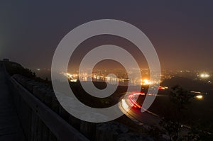 Night photography of roadway up Signal Hill and St. John`s Harbo