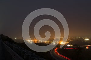 Night photography of roadway up Signal Hill and St. John`s Harbo