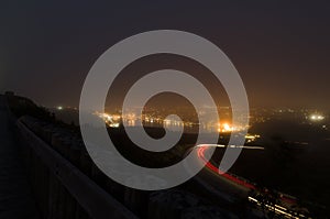 Night photography of roadway up Signal Hill and St. John`s Harbo