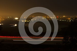 Night photography of roadway up Signal Hill and St. John`s Harbo