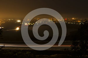 Night photography of roadway up Signal Hill and St. John`s Harbo