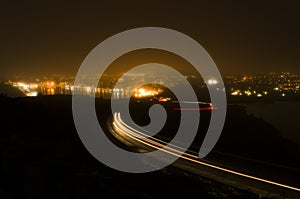 Night photography of roadway up Signal Hill and St. John`s Harbo