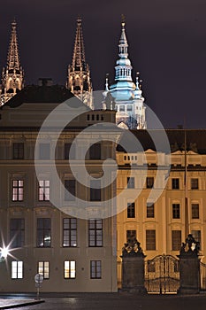 Night Picture of the main entrance to the Prague castle in Prague in Czech Republic. Gate of giants, with baroque statues