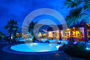 Night pool side of rich hotel
