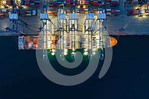 Night scene Aerial view sea port Container cargo loading ship in import export business logistic. Freight transportation. shipping