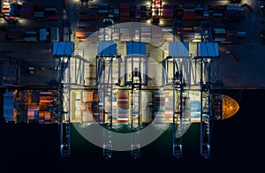 Night scene Aerial view sea port Container cargo loading ship in import export business logistic. Freight transportation. shipping