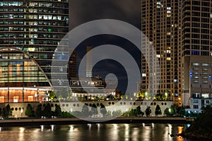 Night scene of the Chicago River and Riverwalk in West Loop Fulton River District