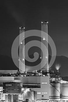 Night scene of chimney of power plant in monochrome