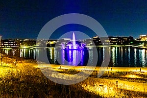 Night scene Fountain and reflections Heartland of America Park Omaha Nebraska