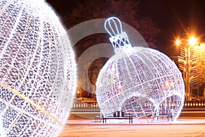 Night scene with illuminated Christmas balls