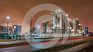 Night scene with Illuminated petrochemical production plant, Antwerp, Belgium