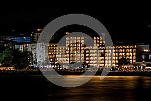 Night scene. Lights of 4 stars SENTIDO Marea hotel building on Black Sea coast