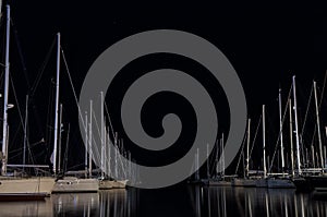 Night scene in a marina with moored yachts, in Lefkada island, Greece