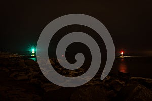 Night scene of mole with navigational red and green at the baltic sea