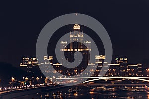 Night scene. The Moscow river embankment. The bridge over the river