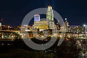 Night scene Omaha Riverfront and downtown area during winter without snow.