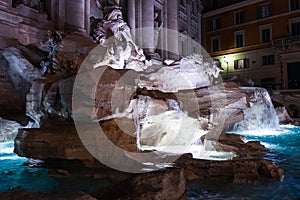 Night scene at the Trevi Fountain. Closeup of the water flowing