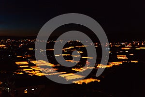 Night scene of a valley in Dalat with the greenhouses to plant flowers and vegetables