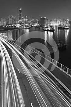 Night scenery of harbor and highway in Hong Kong city